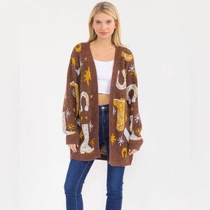 Entro Cozy Western Cardigan with Gold Accents. Horseshoe, spurs, and boots.